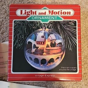 1986 Light In MOTION HOLIDAY ORNAMENT NEVER USED